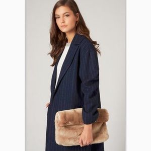 Topshop faux fur clutch in Tan
